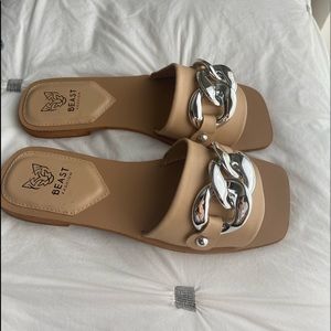 Womens size 8.  Never worn Size 8. Leather slide on Sandal